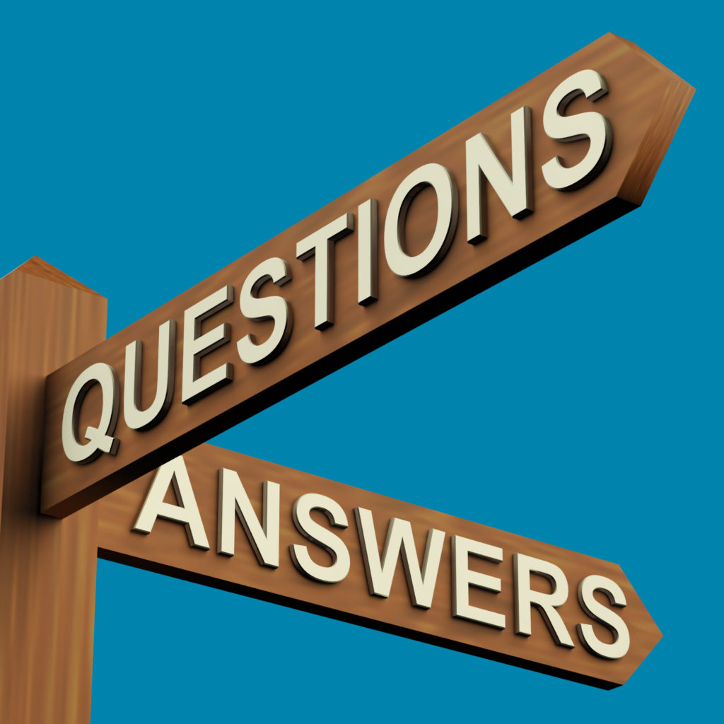 Questions Or Answers Directions On A Wooden Signpost